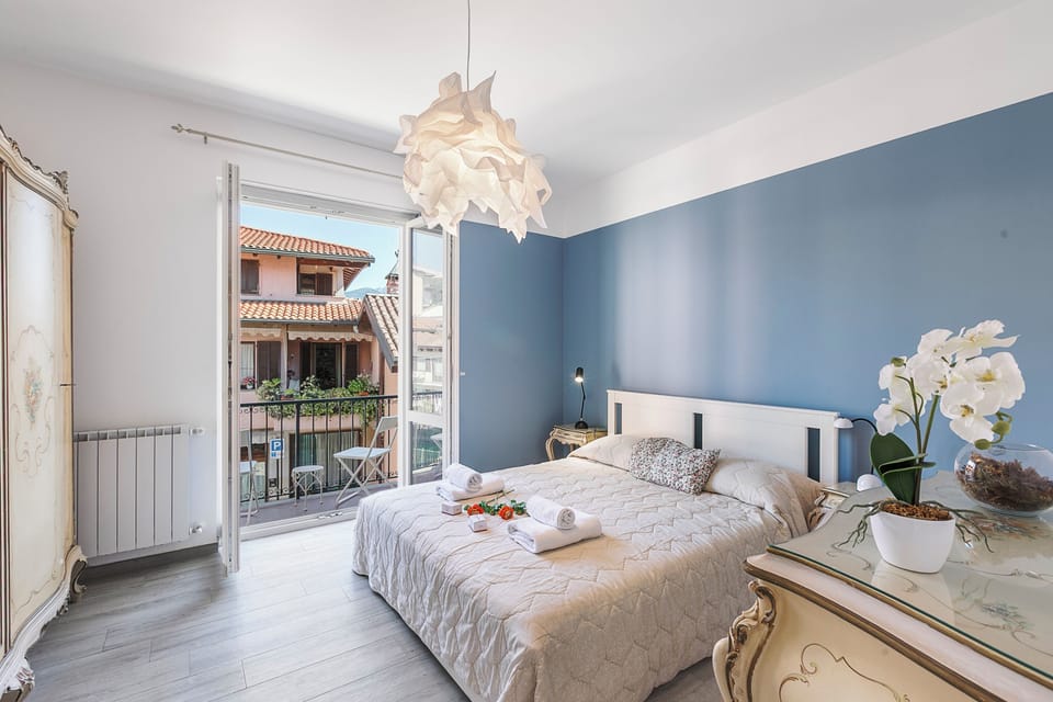 Family Apartment, Multiple Bedrooms, Beachside (Incanto Del Lago 50 Meters From Lake) | 2 bedrooms, free WiFi, bed sheets