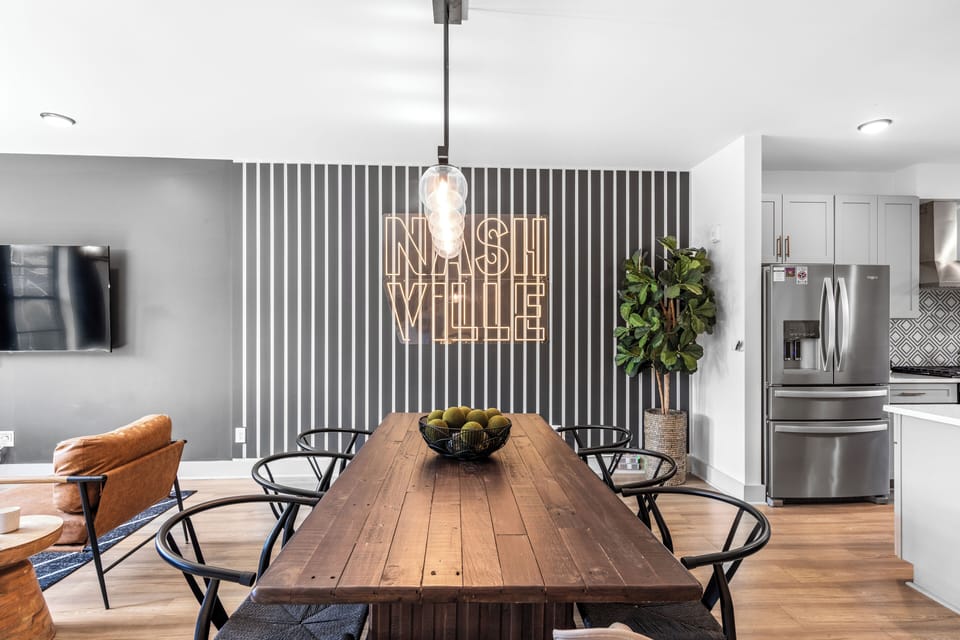 Chic dining area with charming backdrop. 