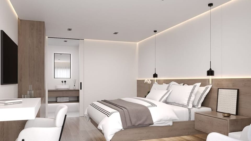 Stretch out in a spacious suite with sleek, calming finishes.