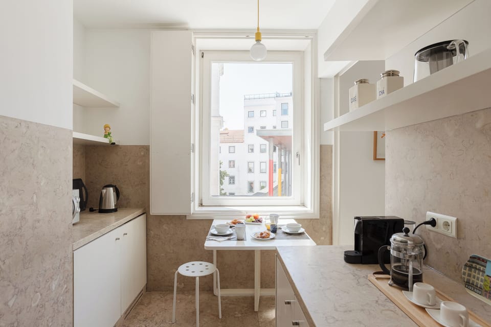 Fully equipped Kitchen with a table for meals