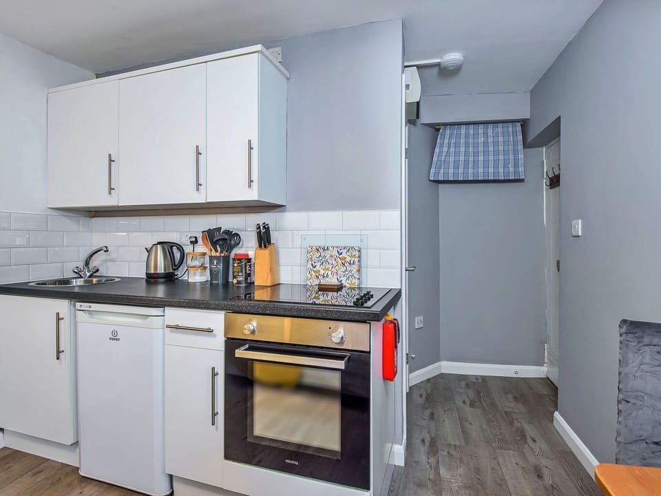 Wood, Flooring, Wood Stain, Cabinetry, Countertop, Kitchen, Plumbing Fixture, Hardwood, Natural Material, Sink