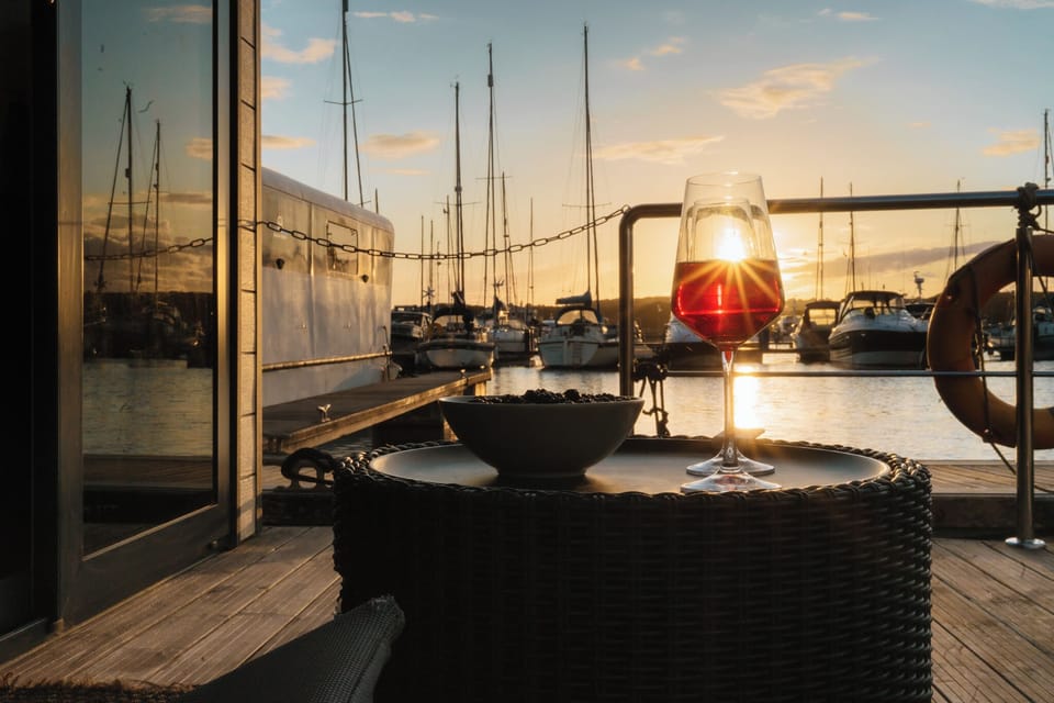 Romantic sunset drinks on the deck – vacation rental houseboat