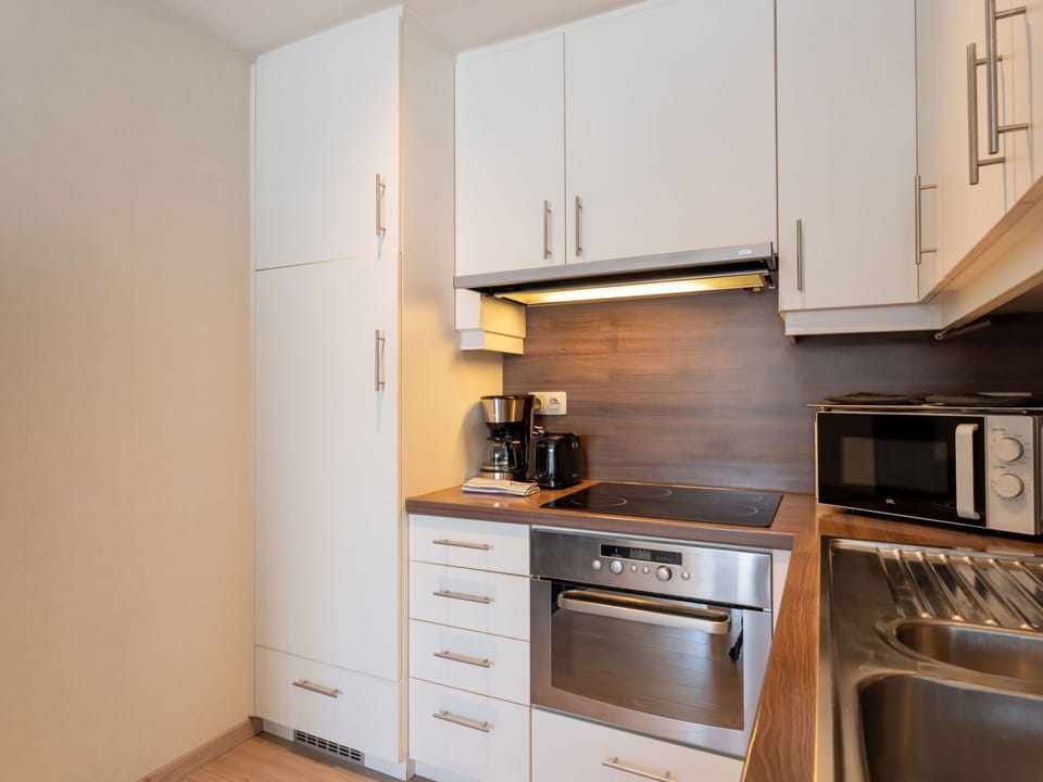 Kitchen Appliance, Countertop, Kitchen, Cabinetry, Furniture, Major Appliance, Flooring, Interior Design, Wood, Floor