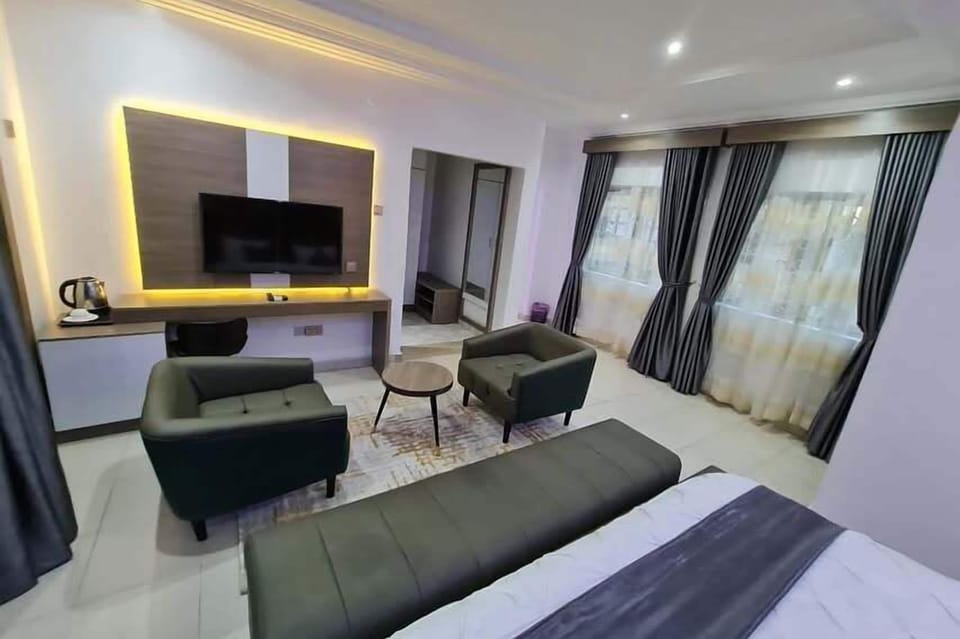 Economy Room, Balcony, City View | Desk, laptop workspace, blackout drapes, soundproofing