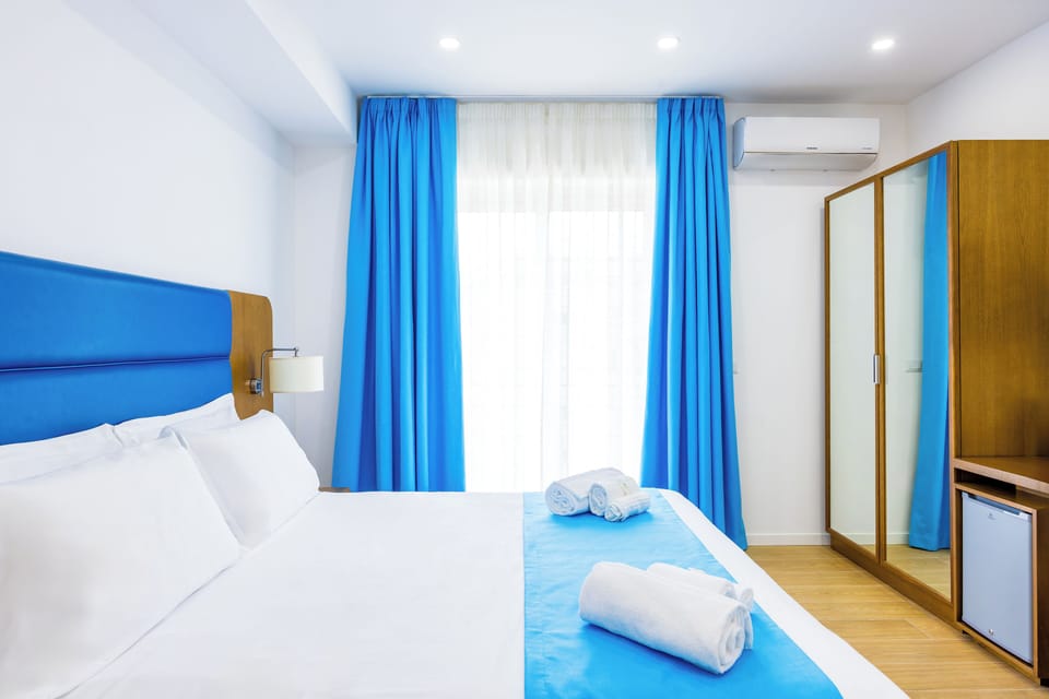 Superior Double Room, Balcony, City View | Desk, laptop workspace, blackout drapes, iron/ironing board