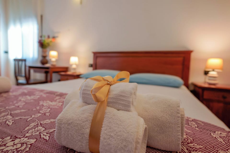 Quadruple Room, City View | Desk, soundproofing, iron/ironing board, free WiFi