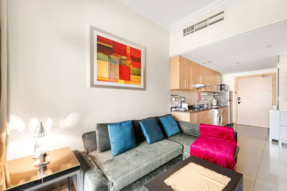 Living Room: Bright and vibrant space with plush seating and modern decor, perfect for relaxation!