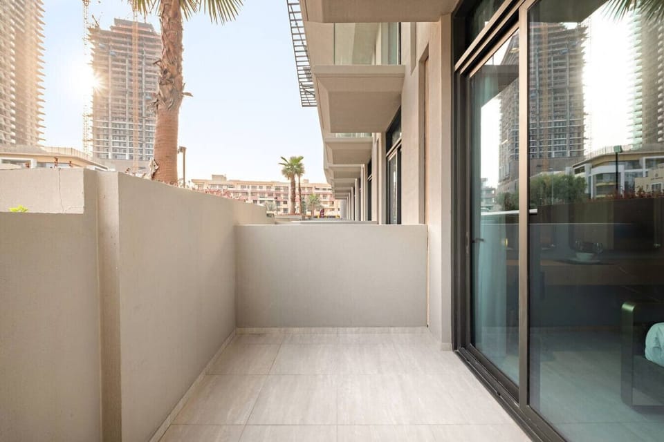 Balcony Retreat: Enjoy stunning views and fresh air on your private outdoor space!