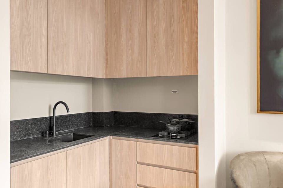 Sleek Kitchenette: Enjoy culinary adventures in this modern, fully equipped space!