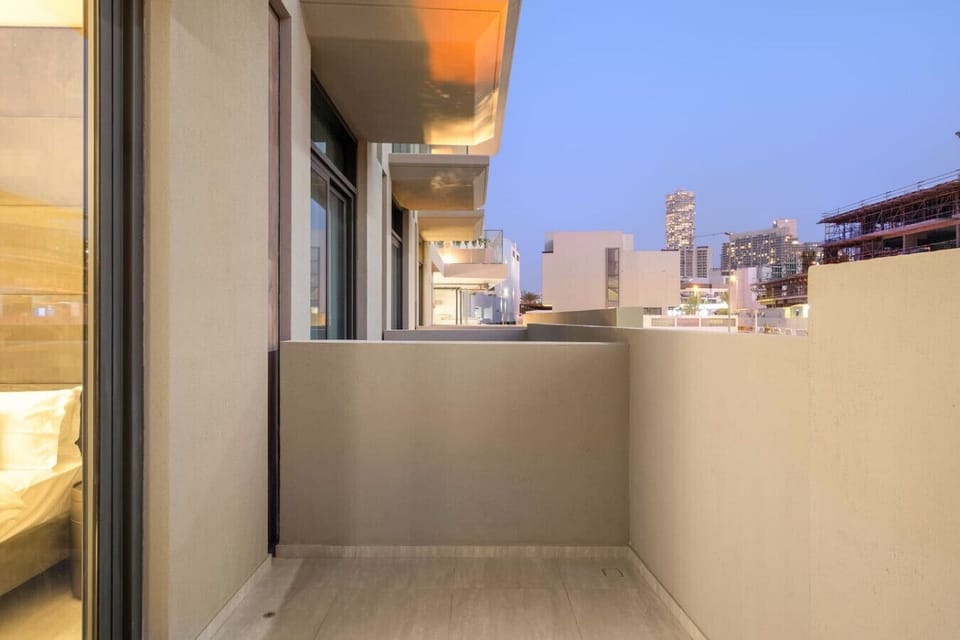 Balcony: Enjoy stunning skyline views while sipping your morning coffee at sunset!