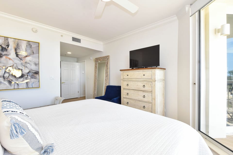 Silver Shells St. Croix 302 - Master Bedroom with Balcony Access and TV