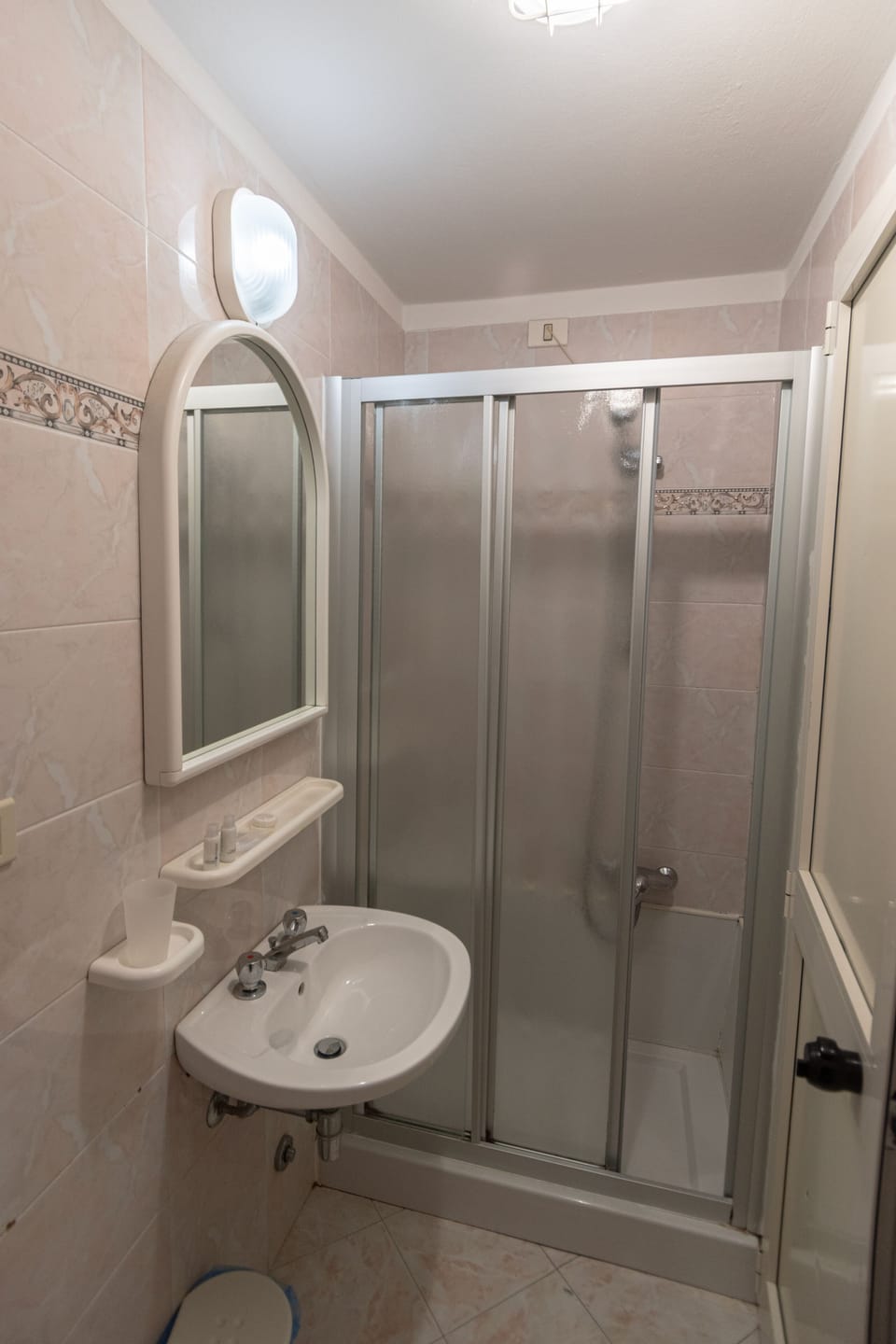 Shower, towels, soap, toilet paper