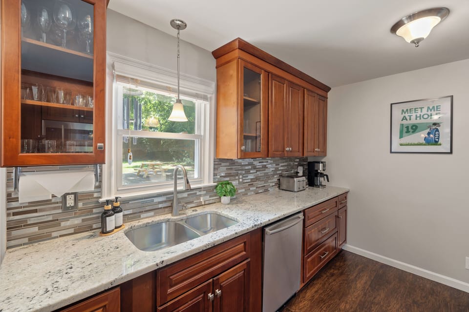 Bright and welcoming with natural light, ample workspace, and an inviting setup 