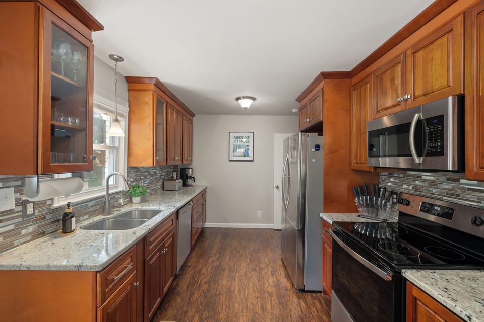 Earth-toned finishes and minimalist design create a clean, calming environment