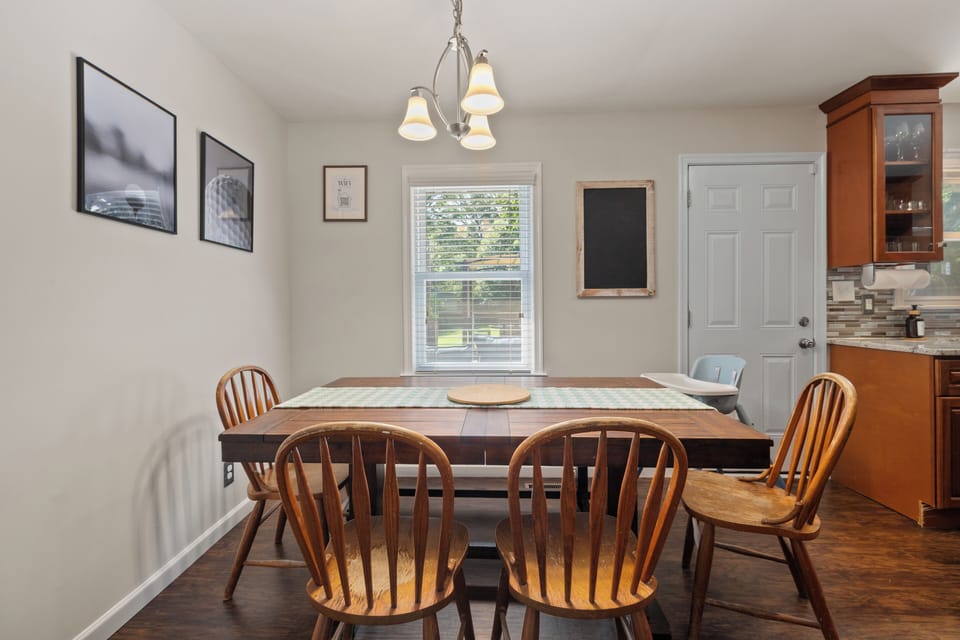 Gather around in a welcoming dining space—complete with a cozy setup