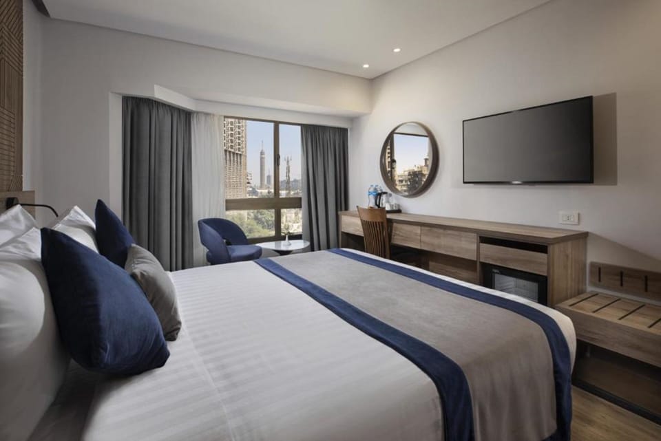 Minibar, in-room safe, blackout drapes, free WiFi