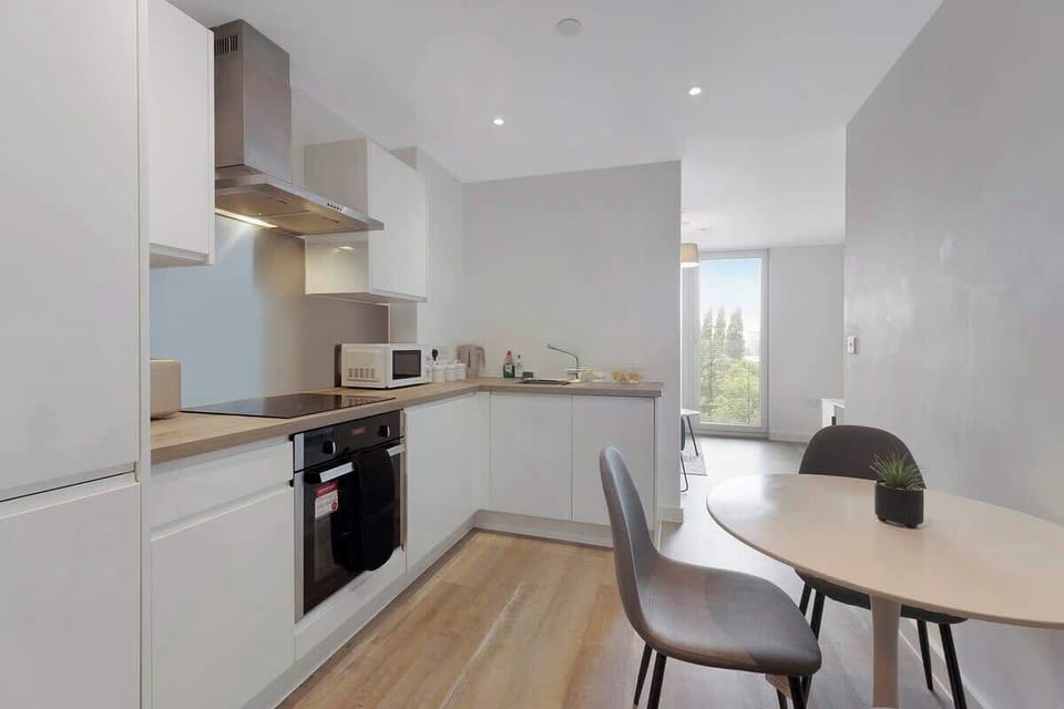 Family-friendly kitchen oasis equipped with all essentials, including a washer & dryer, oven, fridge and full cookware set. Plus, thoughtful touches like children's dinnerware ensure everyone feels right at home in this cosy culinary haven.
