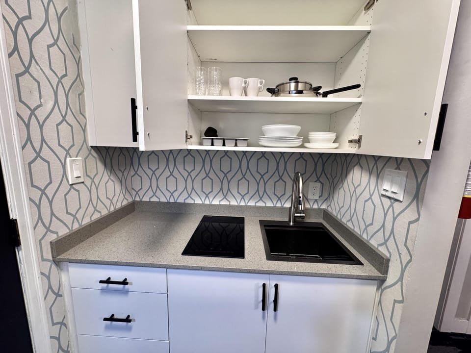 Mini-fridge, microwave, coffee/tea maker, freezer