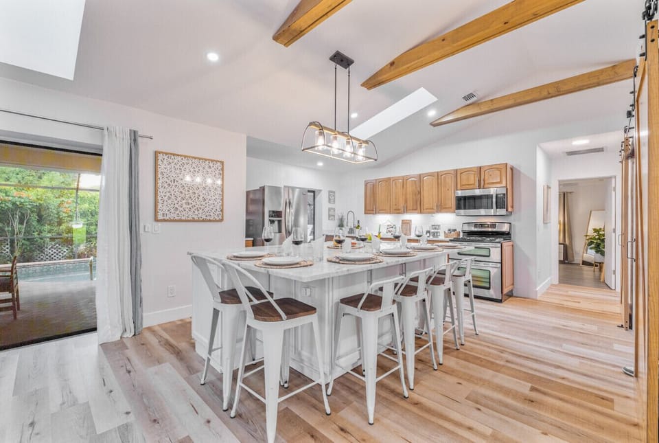 Kitchen & Dining: Bright and airy space with modern fixtures, perfect for culinary adventures!