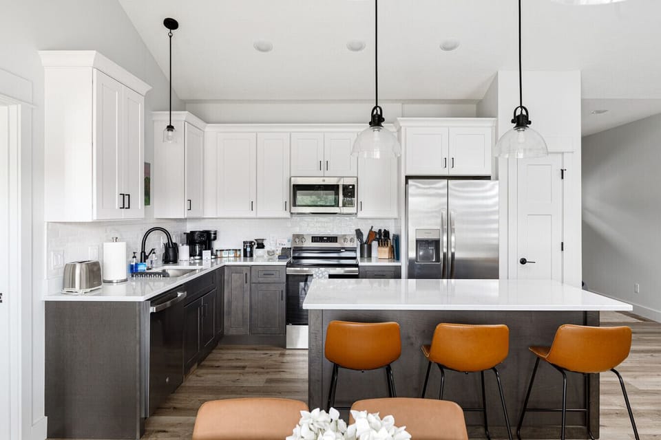 View of the modern kitchen from the dining room