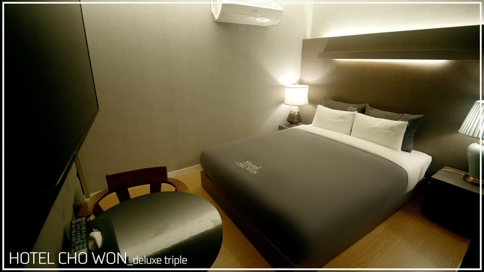 Deluxe Triple Room | Premium bedding, down comforters, memory foam beds, minibar