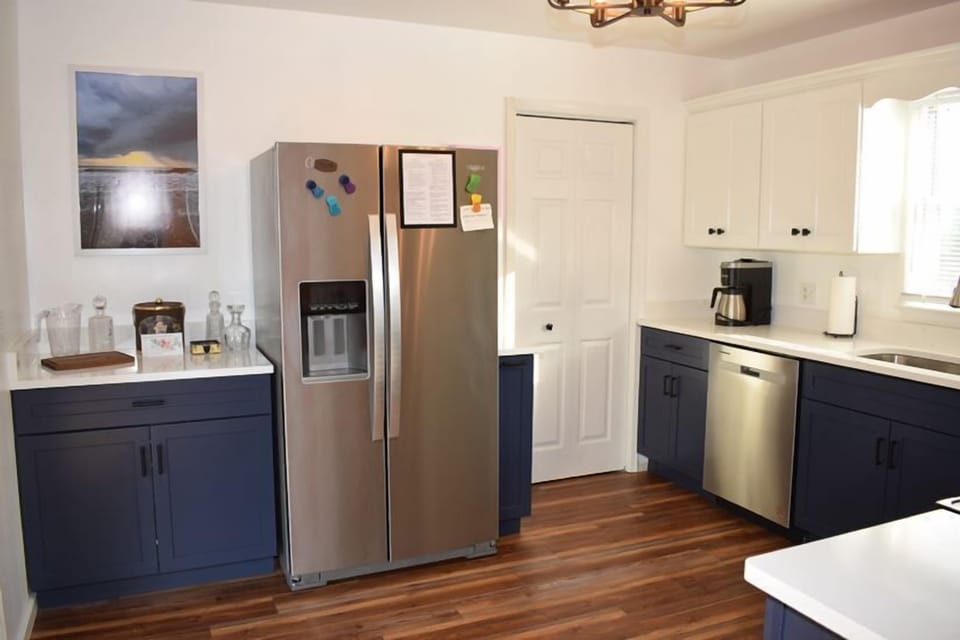 Laundry tucked away in Kitchen
