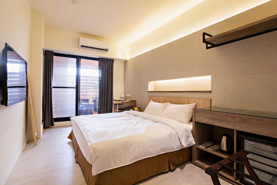 Deluxe Double Room | Premium bedding, free minibar, desk, soundproofing