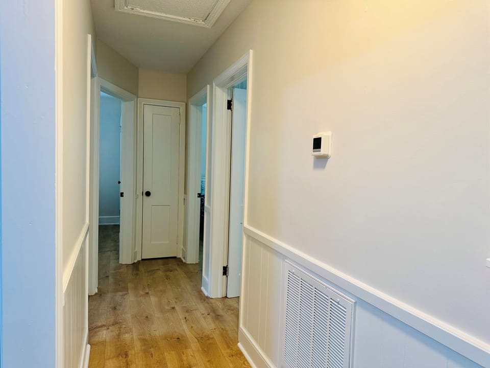 Hallway to bedrooms and bathroom.