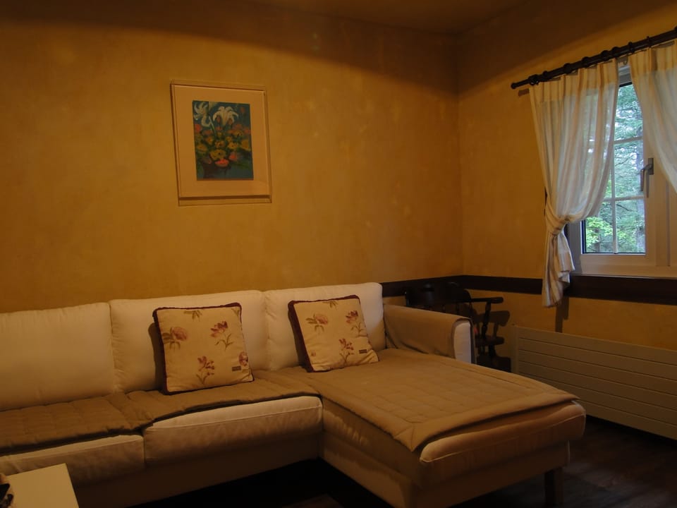 Triple Room - Old Country | Living area | Flat-screen TV