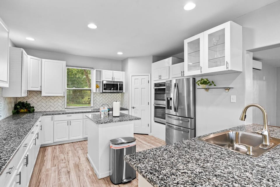 Kitchen | Spacious with granite counters, stainless steel appliances, and center island