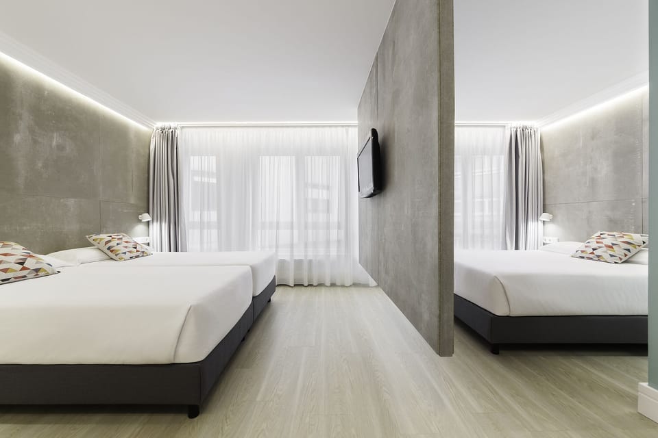 Family Room | Desk, blackout drapes, soundproofing, iron/ironing board