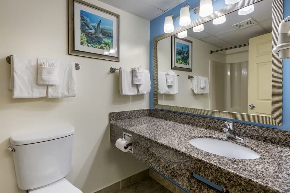 Refresh easily with a spacious vanity and plush towels.
