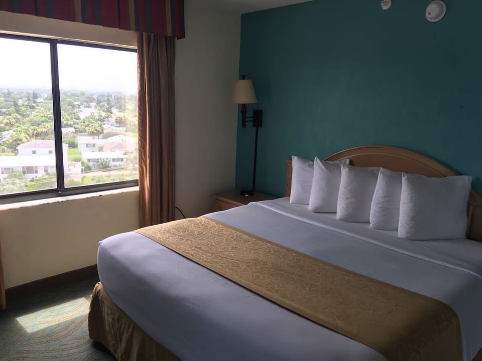 Wake up to daylight and neighborhood views from your bed.