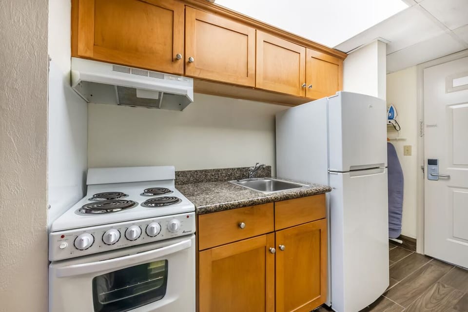 Cook easy meals with a full-size fridge and stovetop.