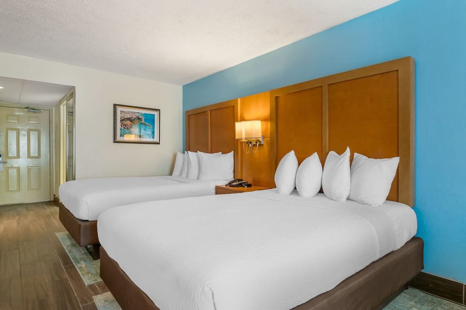 Drift off easily in bright, freshly made double beds.