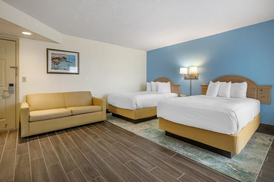 Gather, lounge, and recharge in a spacious two-bed suite.