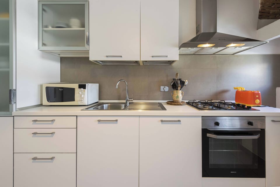 Family Apartment | Private kitchen | Fridge, microwave, oven, stovetop