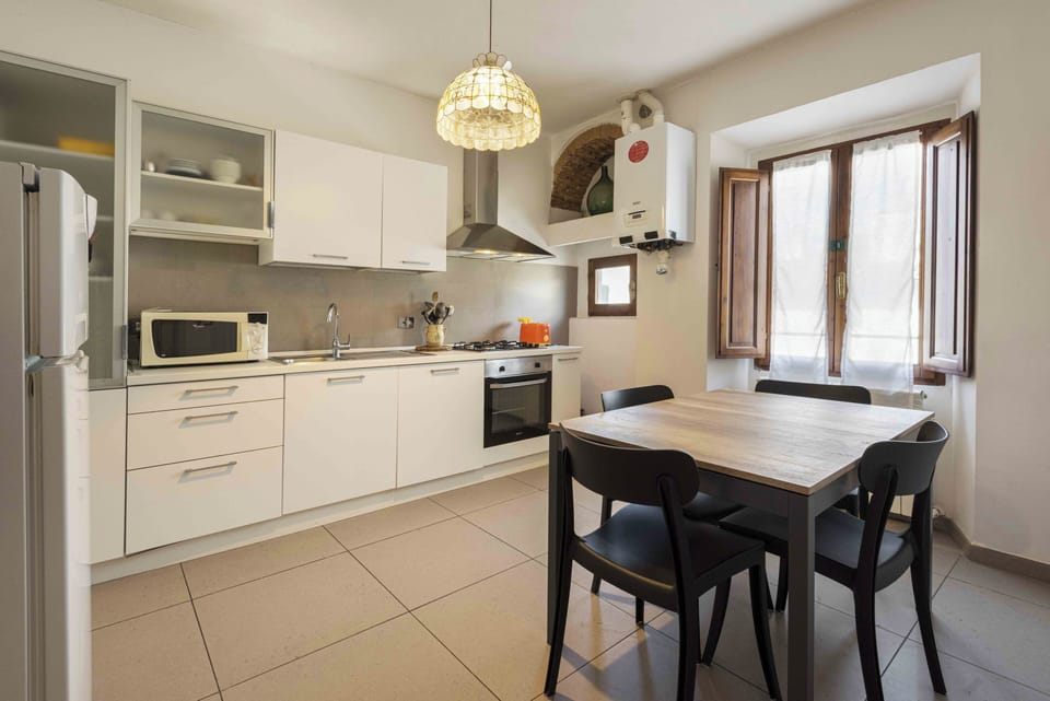 Family Apartment | Private kitchen | Fridge, microwave, oven, stovetop