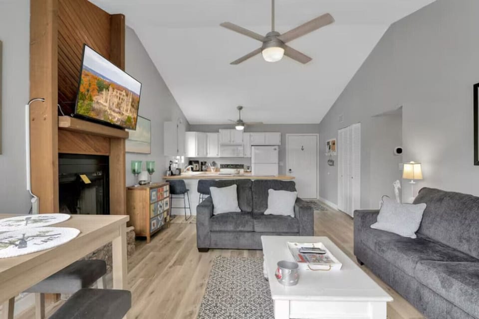 A warm fireplace and TV create the ideal spot for family nights and relaxation.