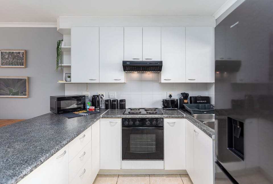 Comfort Apartment, Patio, Garden View | Private kitchen | Full-size fridge, microwave, oven, stovetop