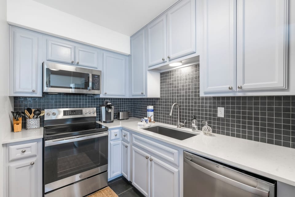 Your fully equipped kitchen features modern appliances and elegant finishes, perfect for preparing meals during your stay.