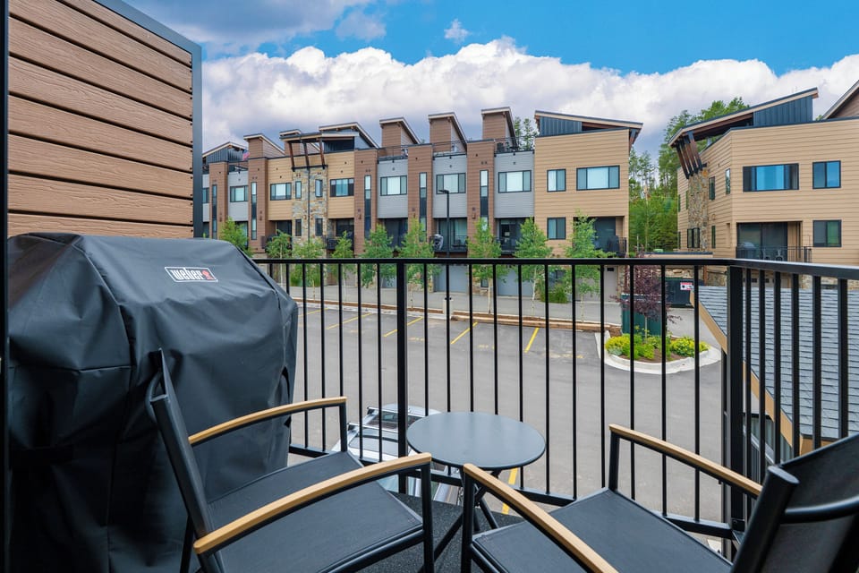 Step onto your private balcony and enjoy morning coffee while watching the quiet neighborhood come to life below.