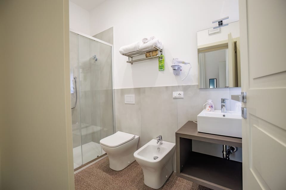 Family Studio Suite, Sea View | Bathroom | Shower, free toiletries, hair dryer, bidet