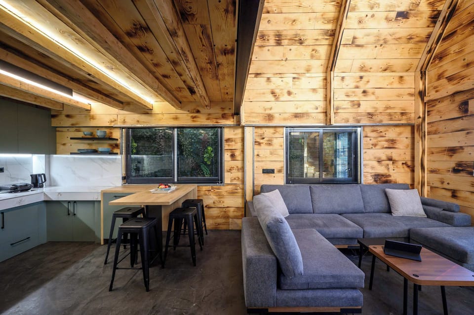Dining and living space bathed in natural light