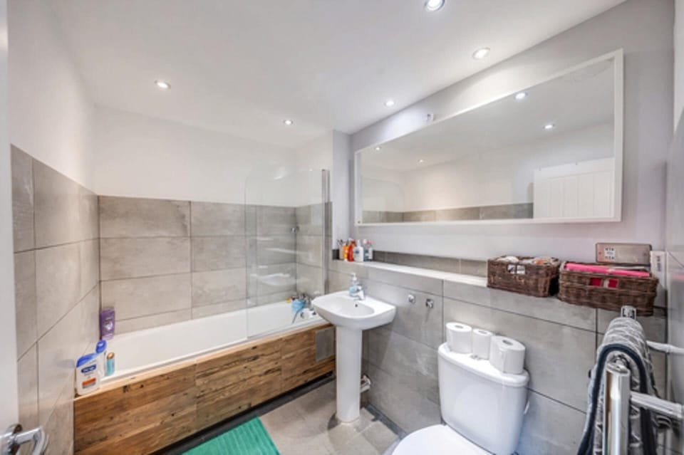 Combined shower/tub, deep soaking tub