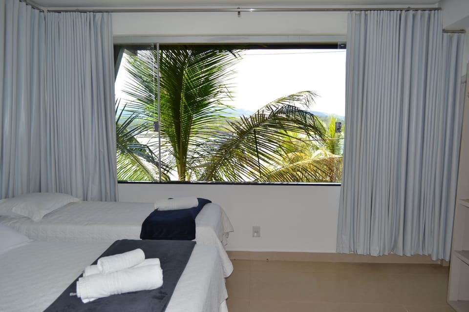 Standard Quadruple Room, Lake View | Iron/ironing board, free WiFi