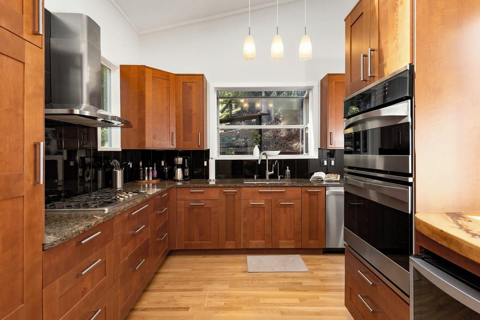 The extensive kitchen is recently remodeled and includes more storage than you can imagine! Stainless steel appliances are prominently featured.