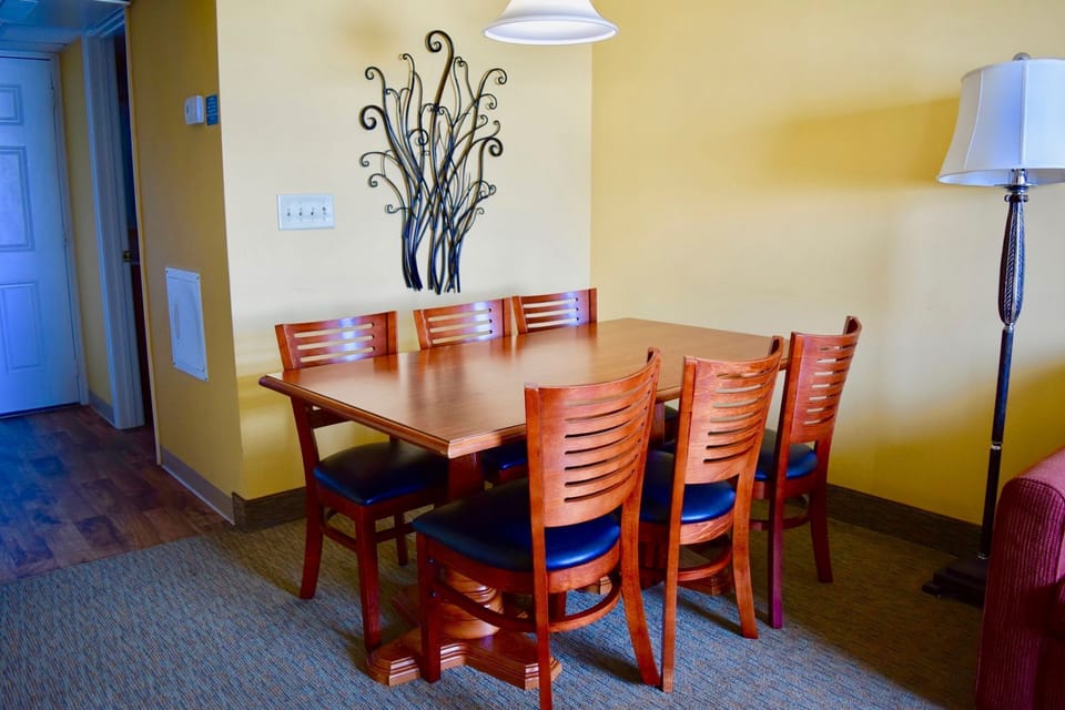 Dining area with seating for six, perfect for family meals together.