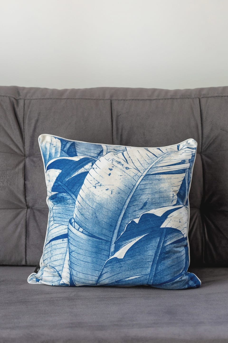 Stylish decor with plush cushions and vibrant touches.