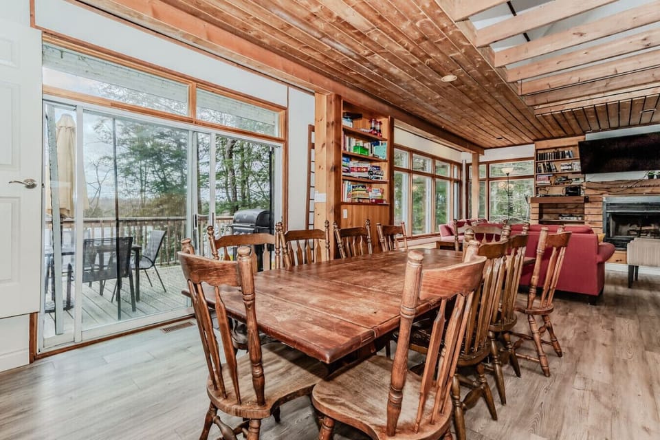 DR - Step out from the dining room through the patio doors onto the sunny deck, an extension of our dining space perfect for enjoying meals outdoors or soaking up the sun.